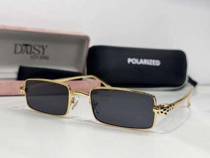 Elegant Cartier women's sunglasses with gold frames and polarized lenses.