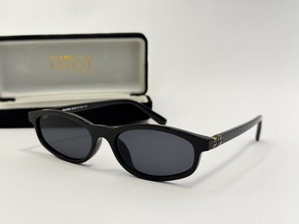 Black Miu Miu women's sunglasses with case, stylish and elegant design.