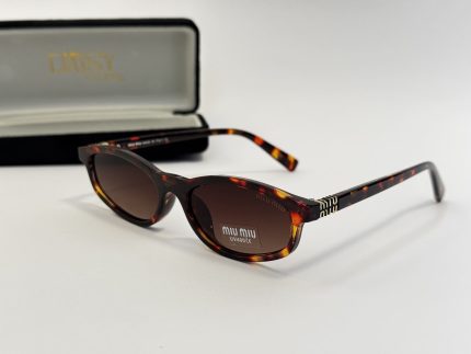 Miu Miu women's sunglasses with tortoiseshell frame and branded case.