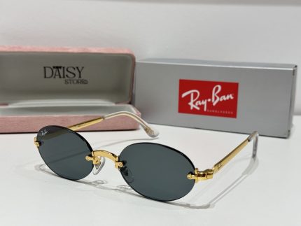 Ray-Ban sunglasses with gold frame and black lenses displayed in case.