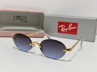Ray-Ban sunglasses with gold frame and gradient lenses, stylish and protective.