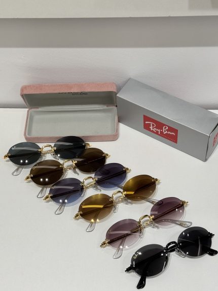 Ray-Ban sunglasses collection with protective case and box displayed.