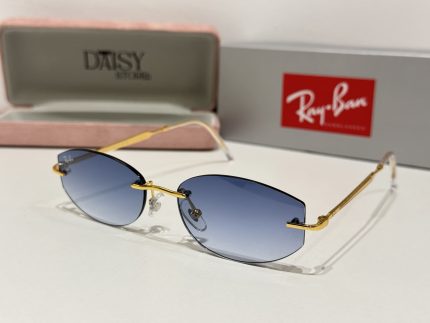 Ray-Ban sunglasses with gold frame and blue lenses in case.
