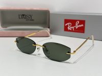 Ray-Ban sunglasses with gold frame, stylish and protective.