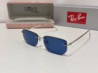 Ray-Ban sunglasses with blue lenses and sleek design.