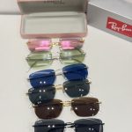Ray-Ban sunglasses collection with colorful lenses and cases.