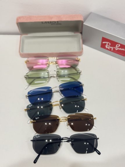 Ray-Ban sunglasses collection with colorful lenses and cases.