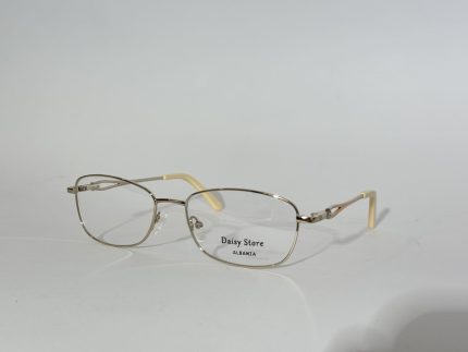 Elegant women's optical frames with gold accents on white background.