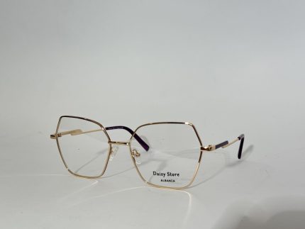 Elegant women's optical glasses with gold frames on white background.