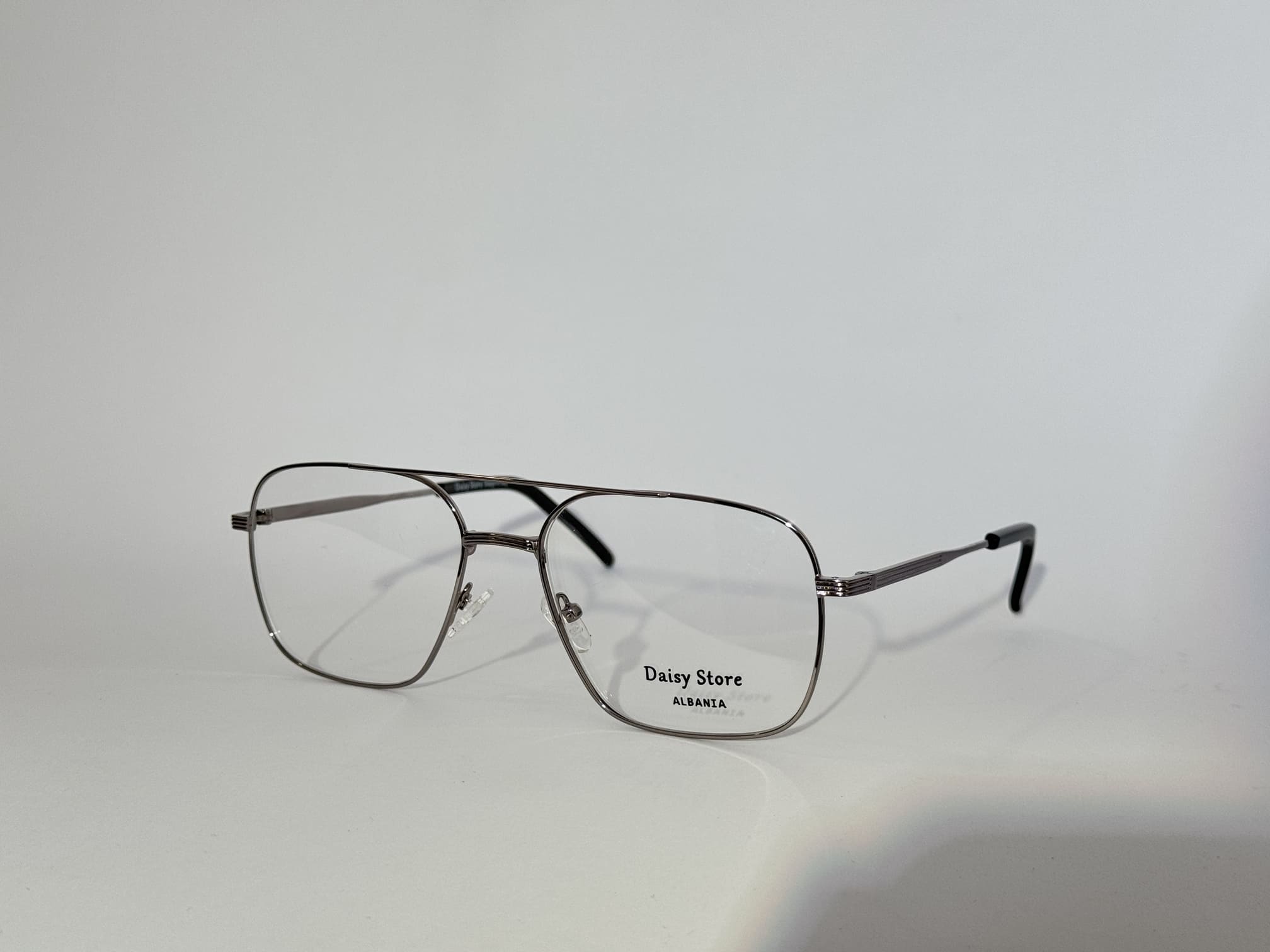 ds-syze-optike-24-kryesore Men's optical glasses with metal frame on white background.