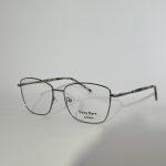 Women's elegant optical glasses with sleek metal frame.