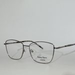 Women's elegant optical glasses with sleek metal frame.
