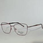 Women's elegant optical glasses with sleek metal frame.