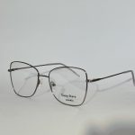 Elegant women's optical glasses with sleek metal frame.