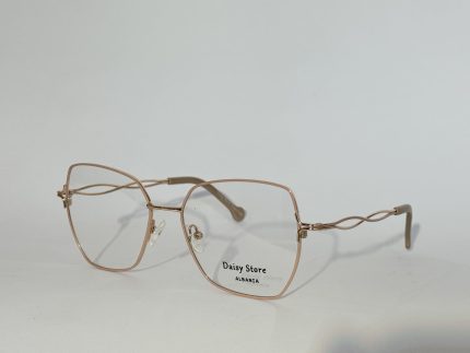 Elegant women's optical glasses with gold frames from Daisy Store.