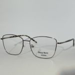 Elegant women's optical glasses with sleek metal frame.