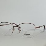 Elegant women's optical glasses with sleek metal frame.