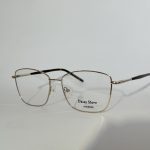 Elegant women's optical glasses with thin metal frame.