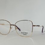 Elegant women's optical glasses with gold frames, ideal choice.