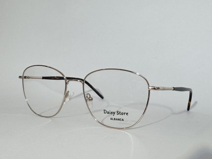 Elegant women's eyeglasses with thin metal frame, Syze Optike Femra.