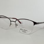Modern women's optical glasses with UV protection, sleek design.