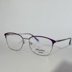 Women's stylish optical glasses with purple accents.