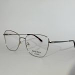 Women's elegant optical glasses with sleek metal frame.
