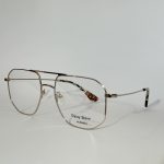 Elegant women's optical glasses with sleek metal frame.