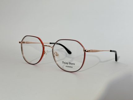 Elegant women's optical glasses with thin metal frames.