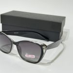 Anna Smith sunglasses with black case, stylish eyewear.