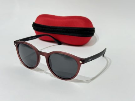 Syze Dielli Liberty Origjinale sunglasses with red case on white background.