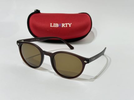 Syze Dielli Liberty Origjinale sunglasses with red case on white background.