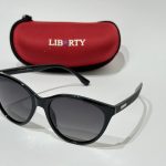 Syze Dielli Liberty Origjinale sunglasses with red case.