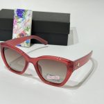 Anna Smith sunglasses, red frame, elegant design, protective lenses.
