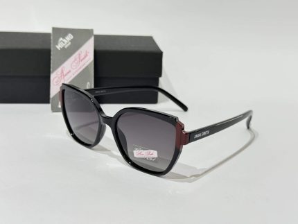 Anna Smith sunglasses, elegant black frame, protective lenses.