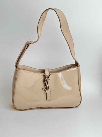 YSL Hobo beige handbag for women with logo detail.