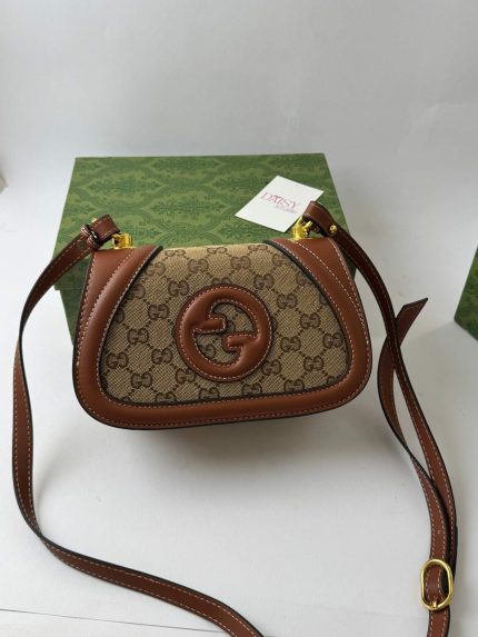 Gucci Blondie GG monogram handbag for women on display.