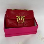 Red Pinko Love Bag Puff in pink box with gold chain.