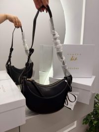Polène Cyme Mini black handbag with elegant design for women.
