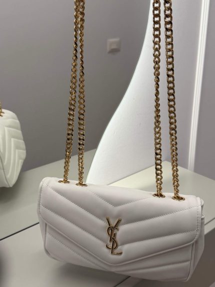 White Saint Laurent Loulou bag with gold chain straps.
