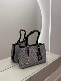 Gucci GG Supreme Tote, elegant designer handbag with iconic pattern.