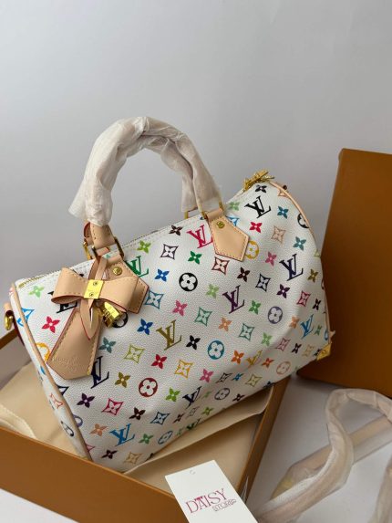 Louis Vuitton Speedy Bandoulière handbag with colorful monogram design.