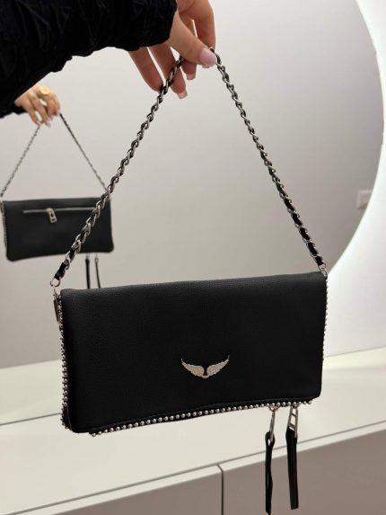 Zadig & Voltaire black clutch with chain strap and wing emblem.