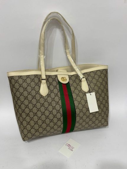 Gucci Ophidia GG tote bag with iconic monogram and green-red stripe.