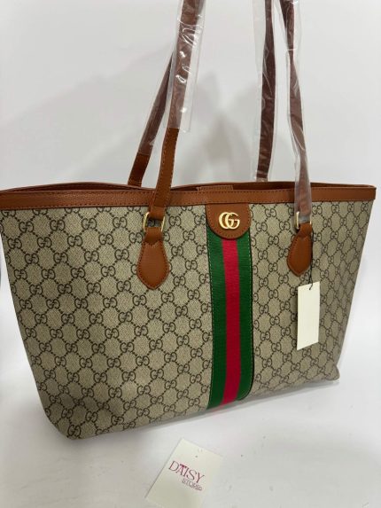 Gucci Ophidia GG tote bag with signature stripe and logo.
