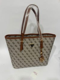 Guess monogram tote bag with brown leather straps.