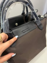 Çanta Longchamp Le Pliage handbag, elegant brown design with black accents.