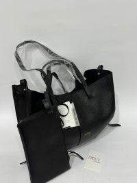Çantë Polène Cyme Mini, elegant black handbag with pouch.