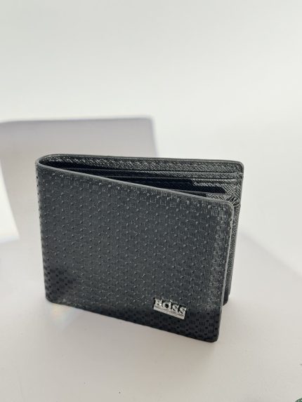 Elegant black Hugo Boss men's wallet on white background.