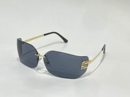 Miu Miu rimless shield sunglasses with gray lenses and gold accents.